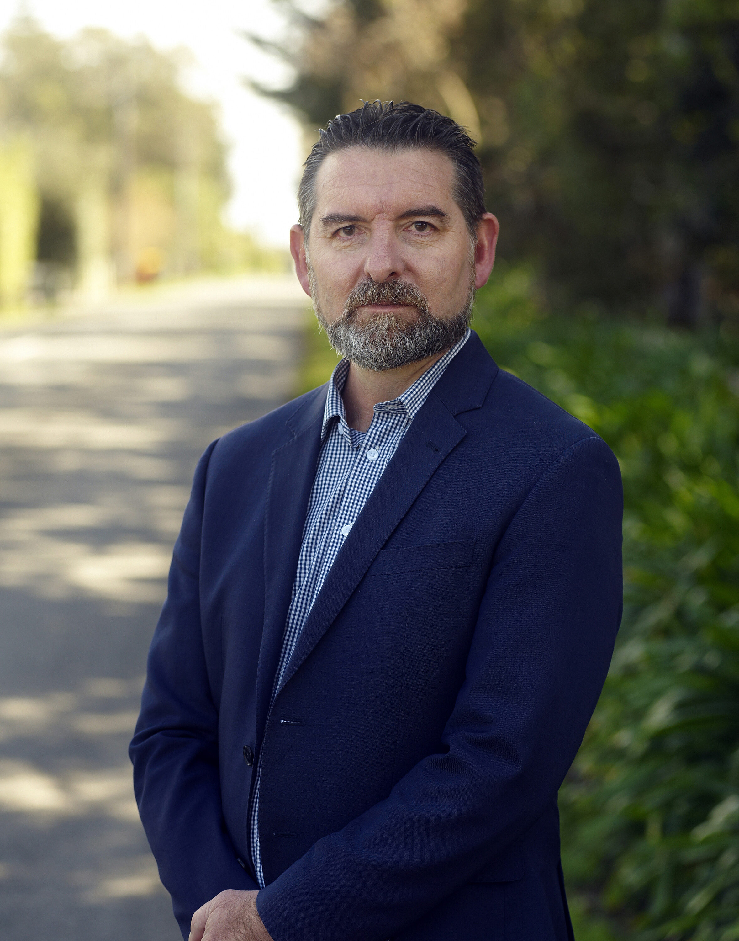 Bryce Holmes, Director and Senior Planner at Land Matters, standing outside Land Matters headquarters