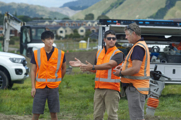 Land Matters project managers coordinating contractors and site activities during a residential land development project in New Zealand.